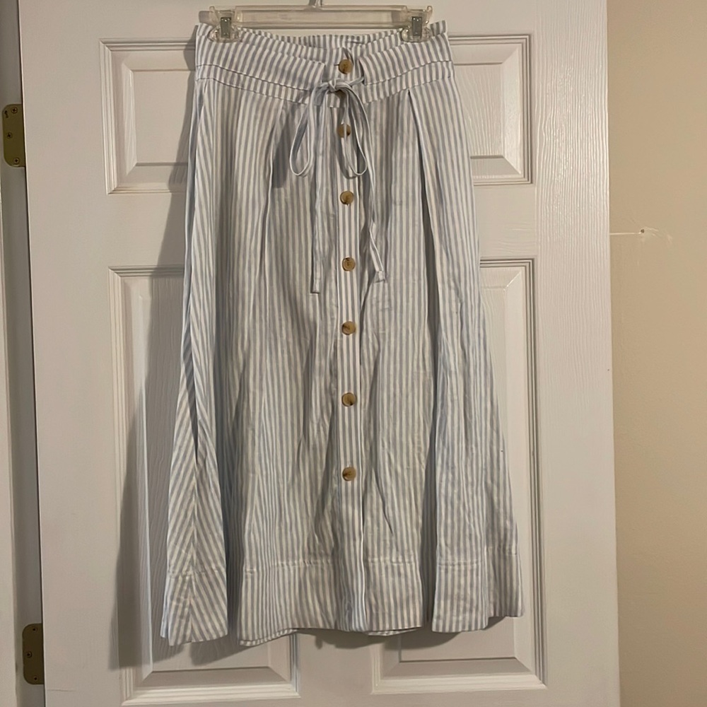 Blue and white stripe midi skirt. Buttons all the way down and tie at waist